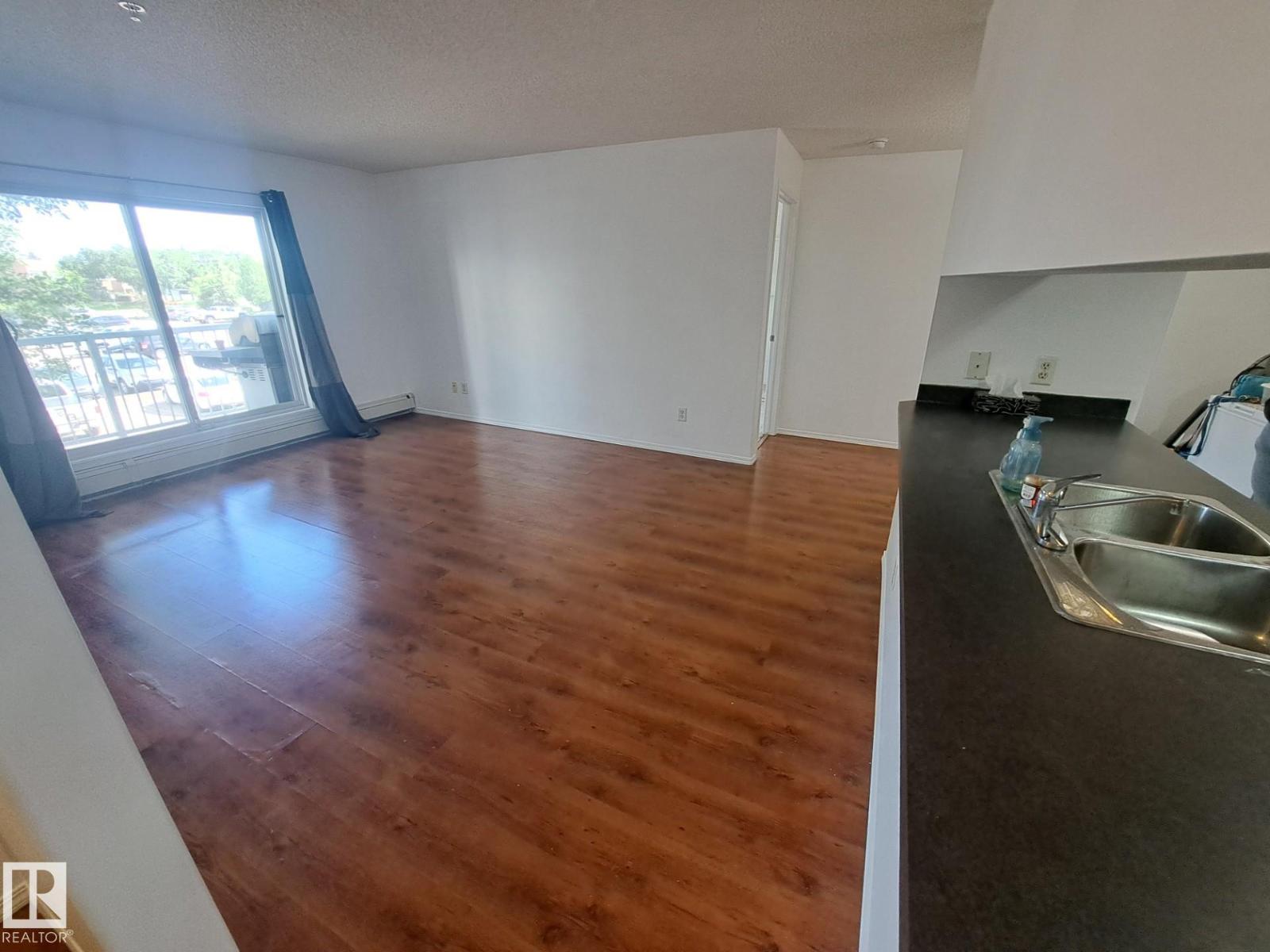 #205 9910 107 ST