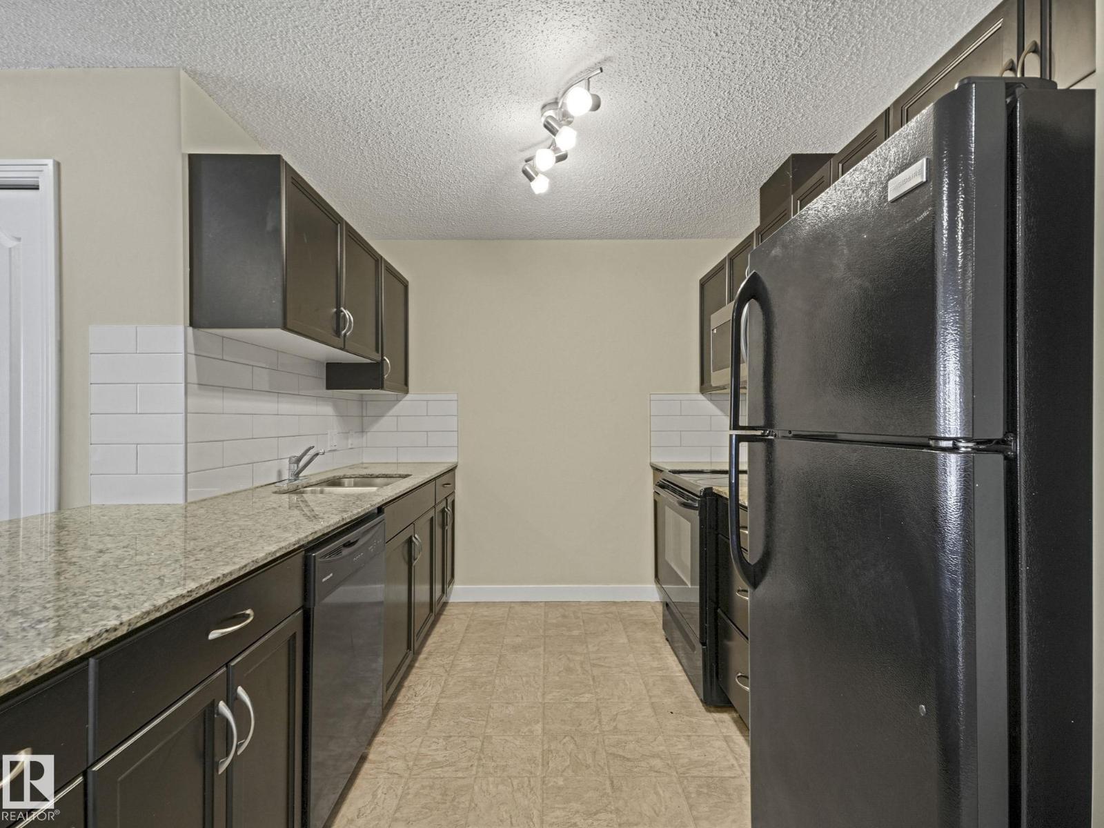 #317 12650 142 AV NW