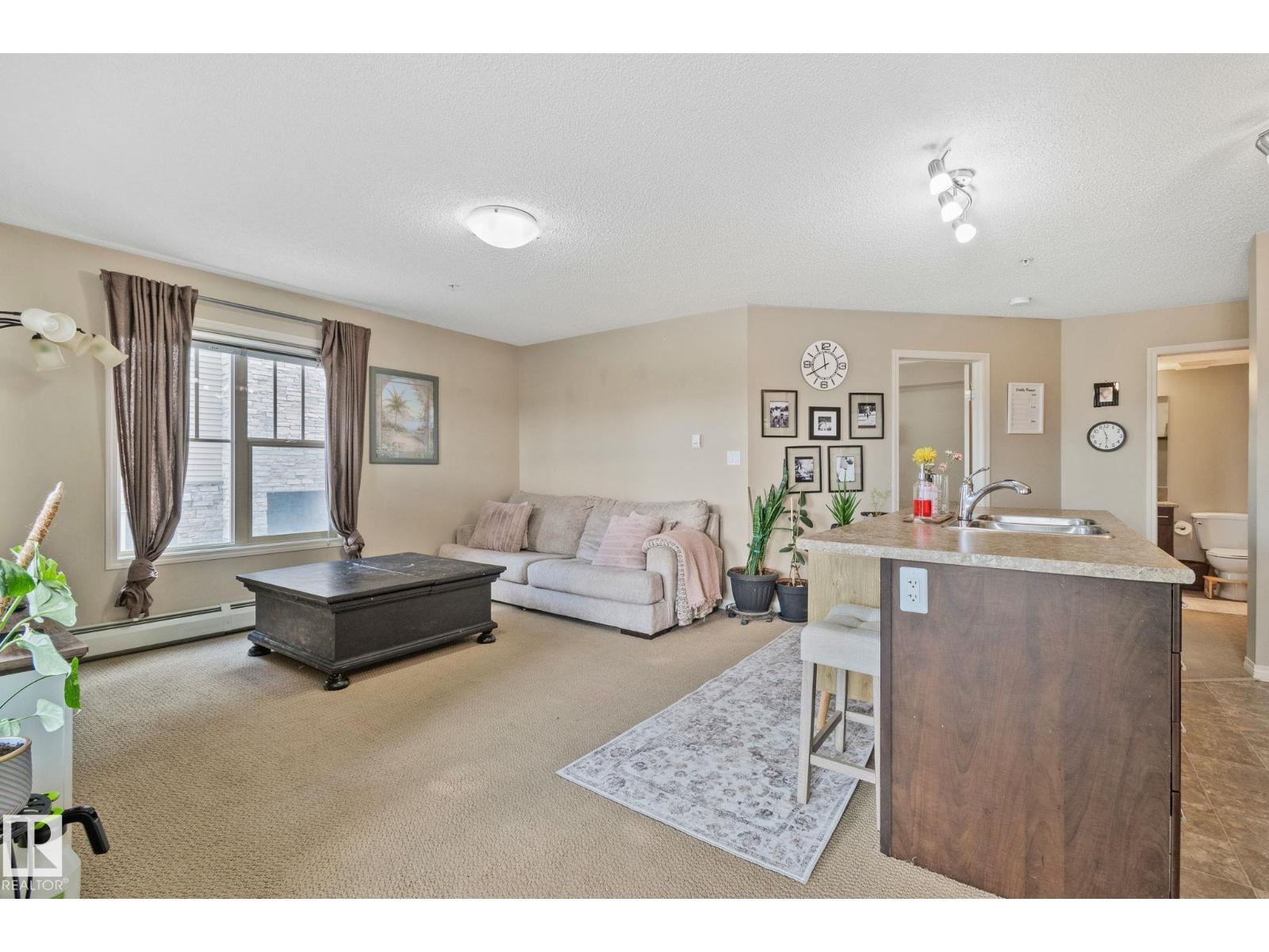 #206 103 Ambleside DR SW