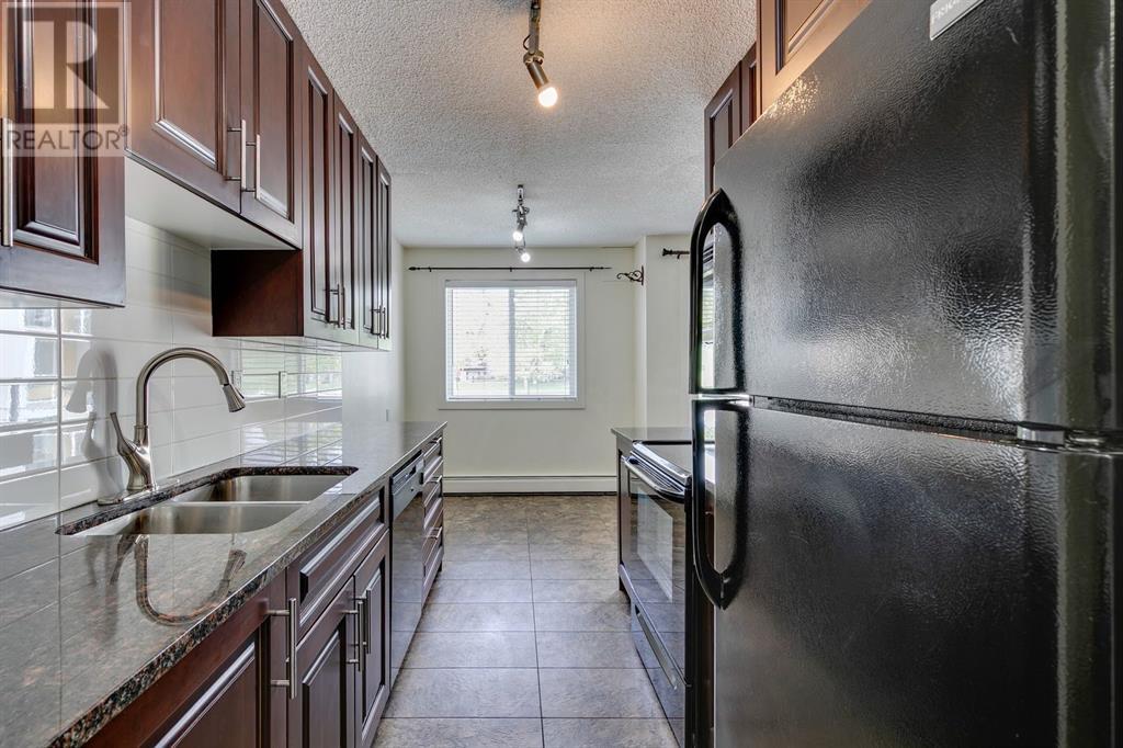 203, 4455A Greenview Drive NE