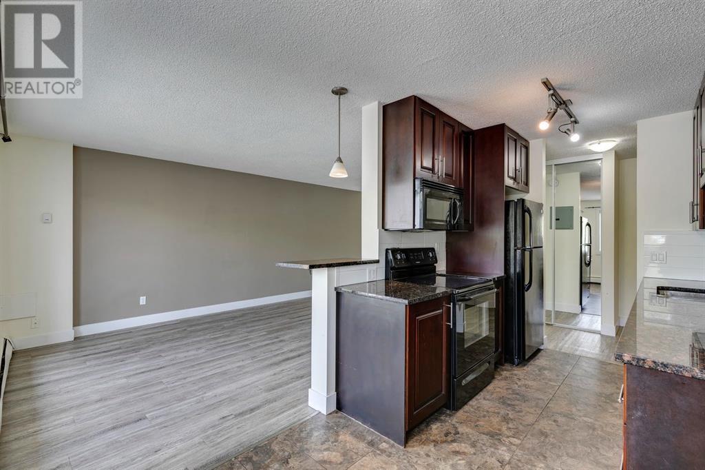 203, 4455A Greenview Drive NE