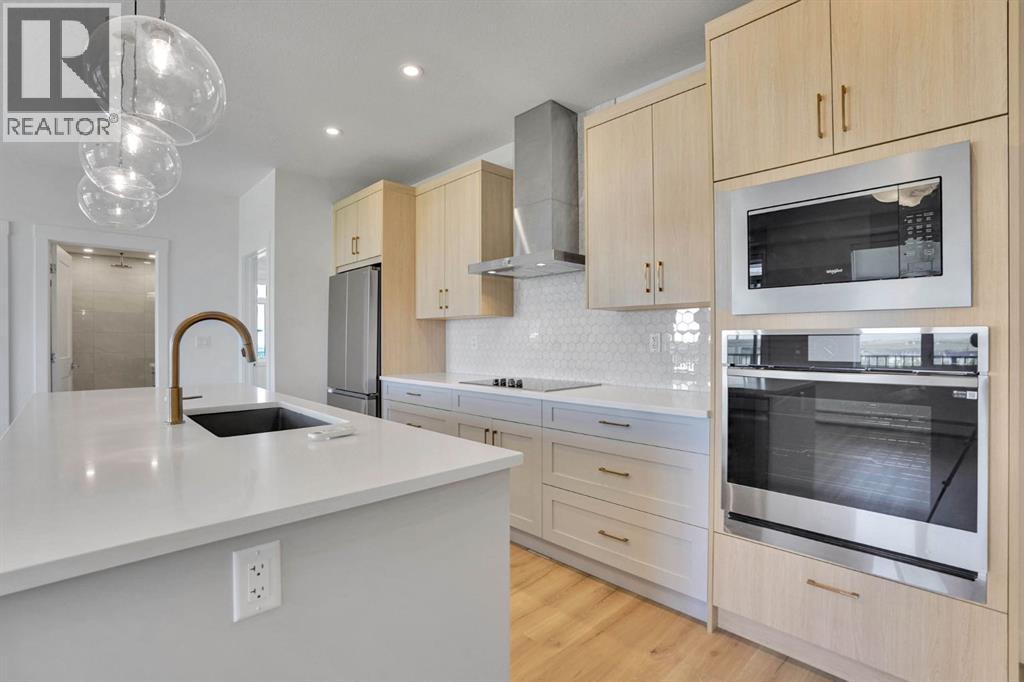 212, 50 Sage Hill Walk NW