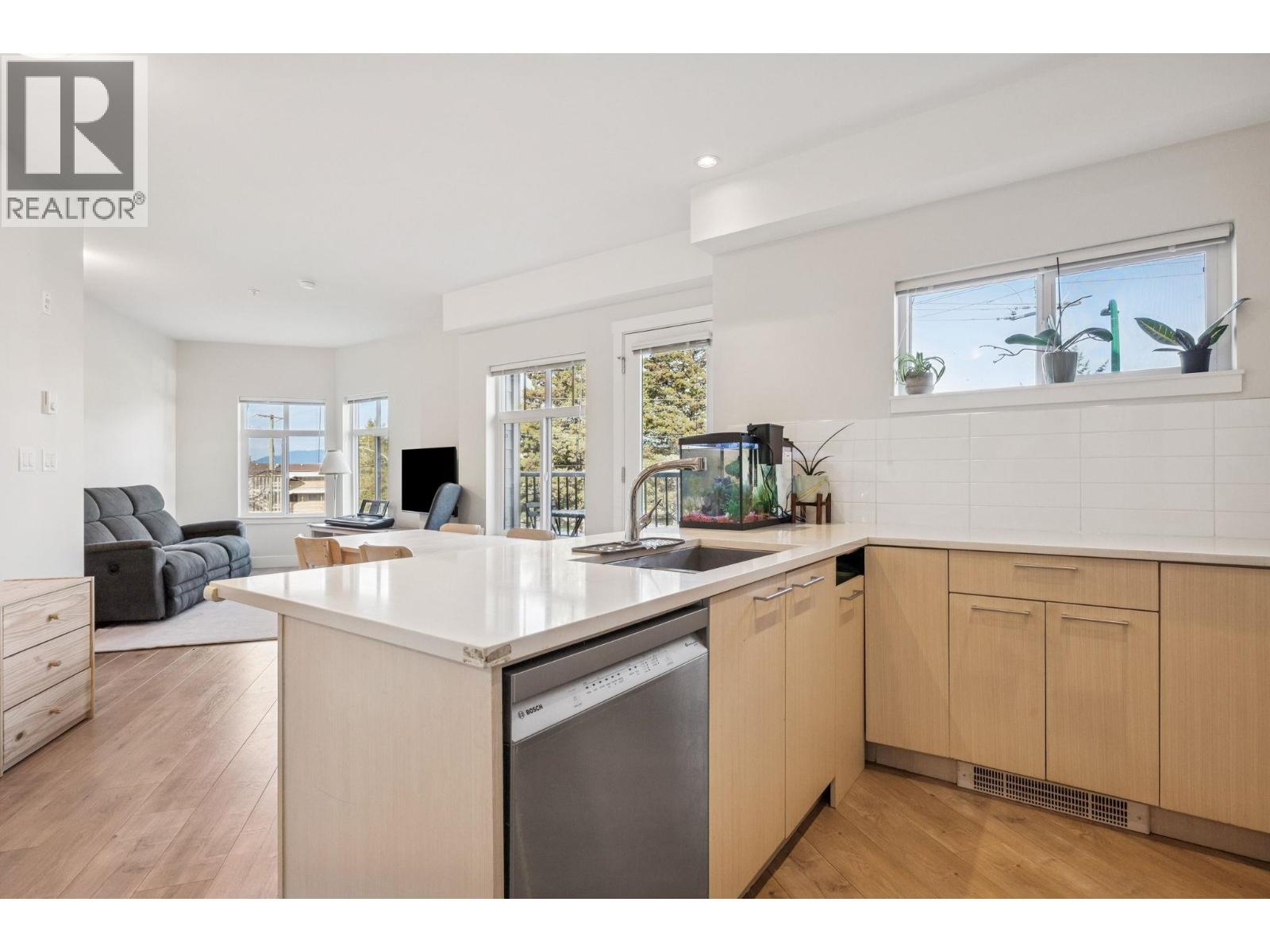 205 7180 BARNET ROAD