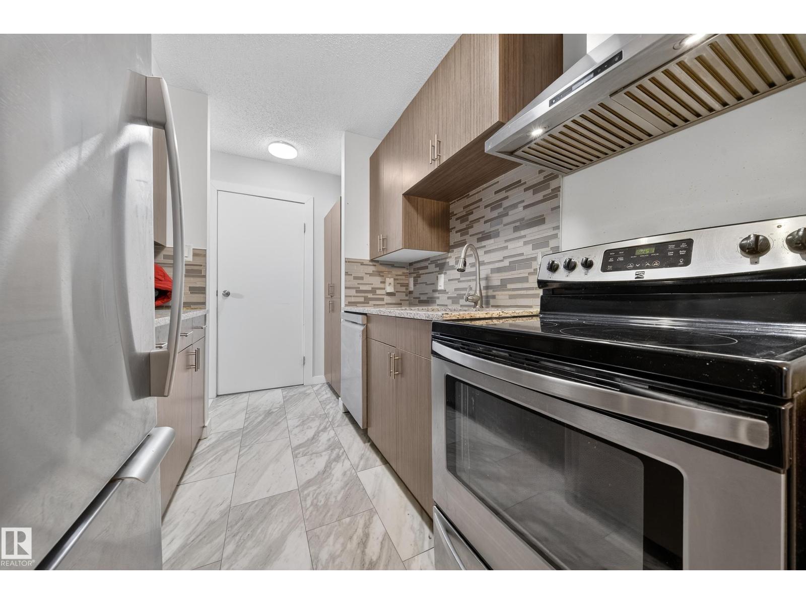 #202 10615 156 ST NW