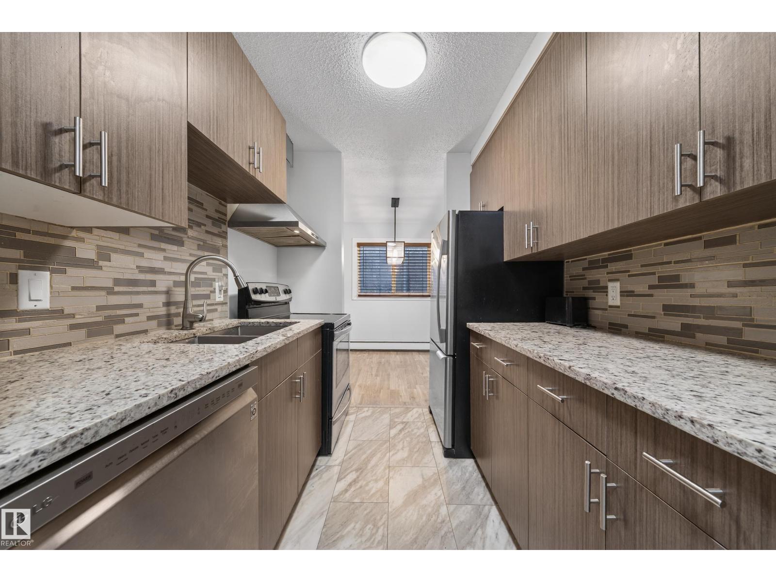 #202 10615 156 ST NW