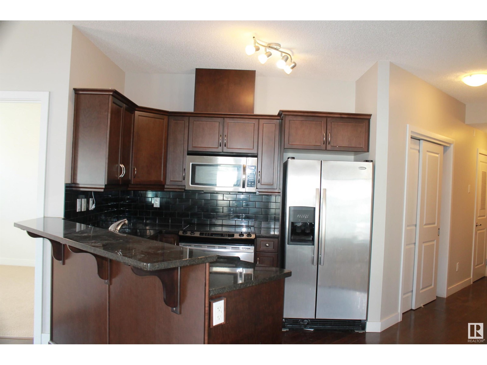 #103 7907 109 ST NW