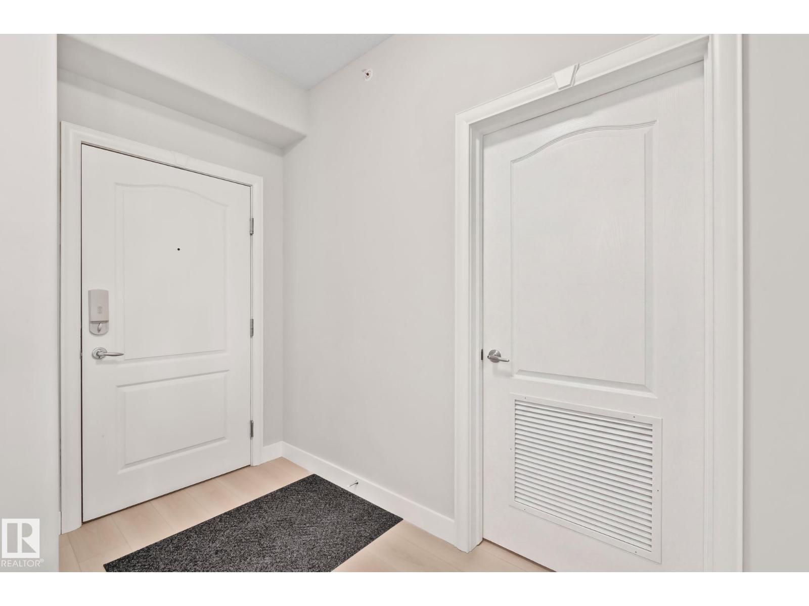 #432 1406 HODGSON WY NW