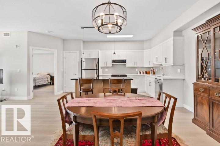 #432 1406 HODGSON WY NW