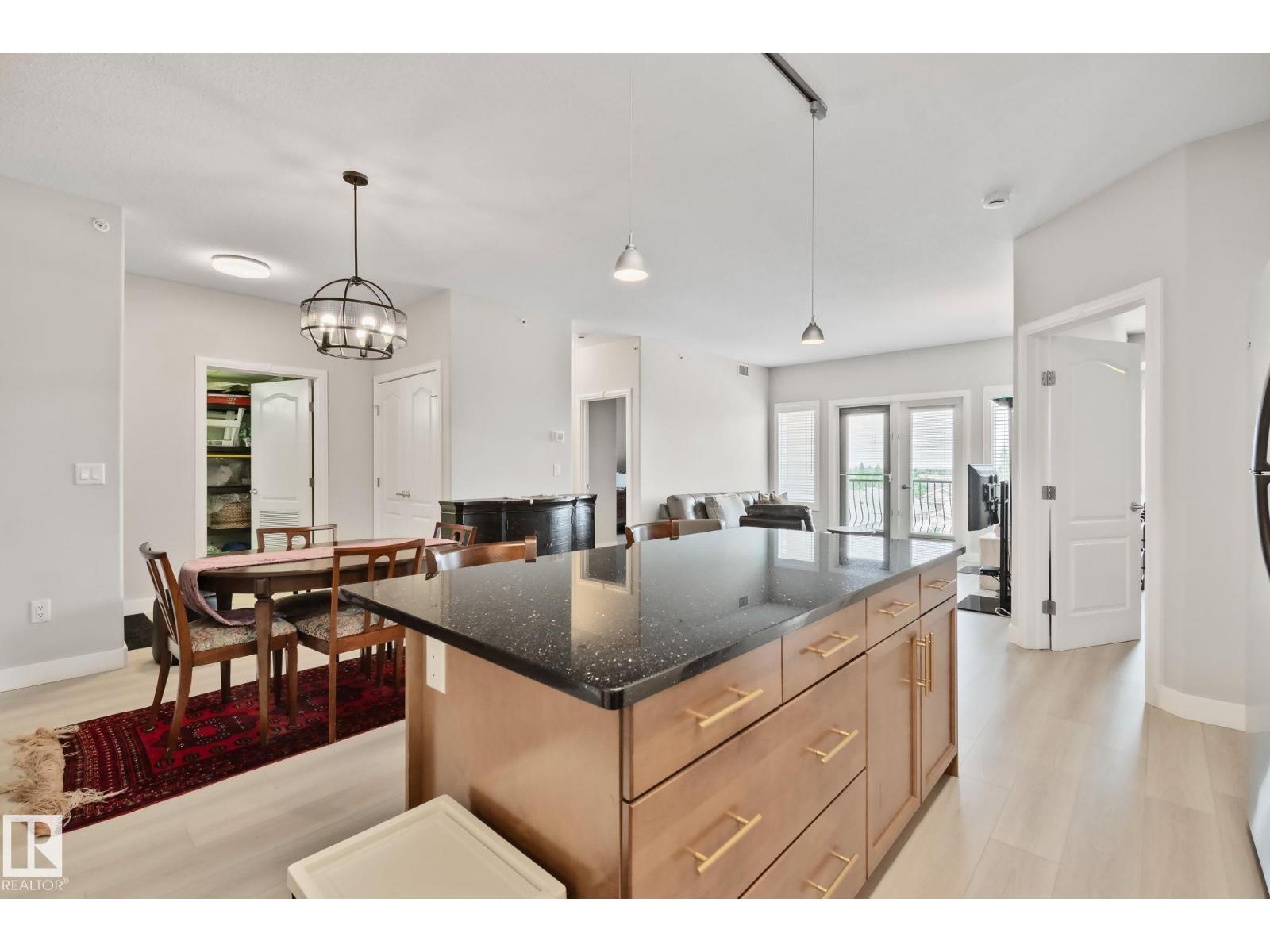 #432 1406 HODGSON WY NW