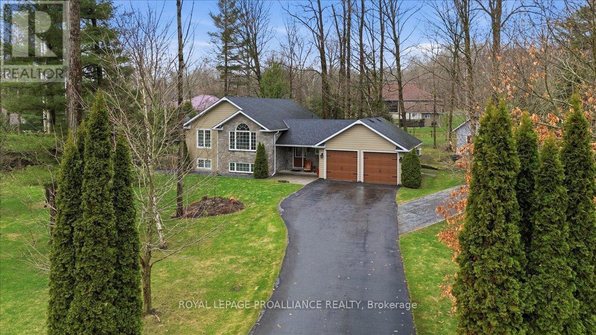 80 WHISPERING WOODS DRIVE