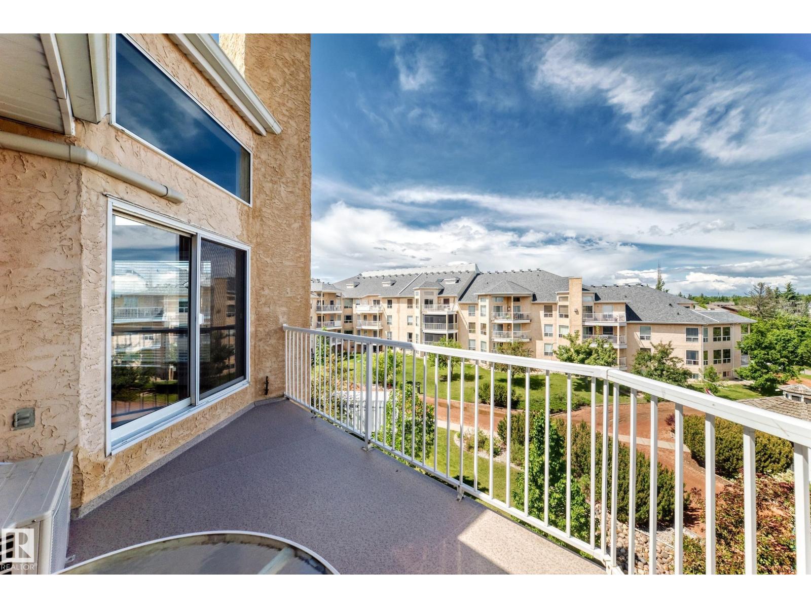 #422 15499 CASTLE DOWNS RD NW