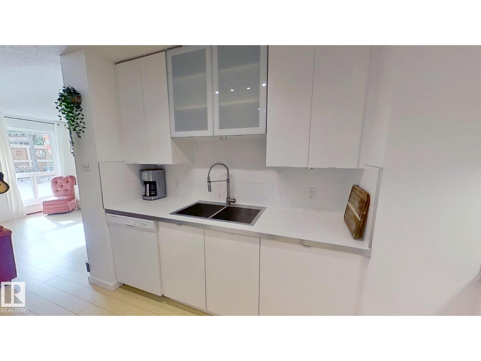 #104 10175 114 ST NW