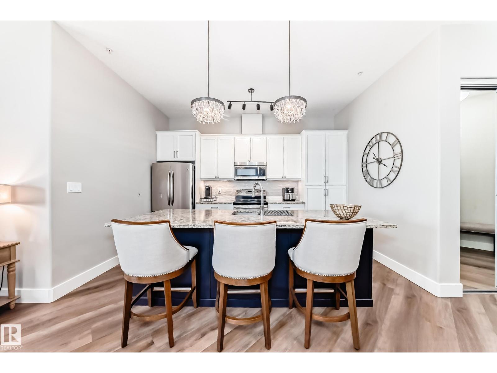#446 6079 MAYNARD WY NW