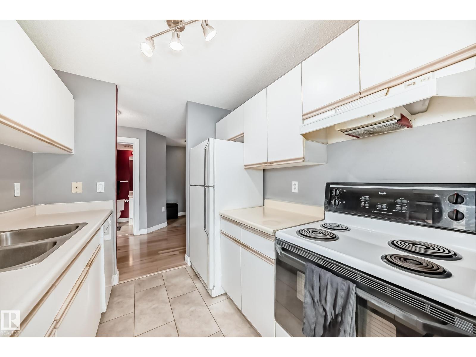 #239 10636 120 ST NW