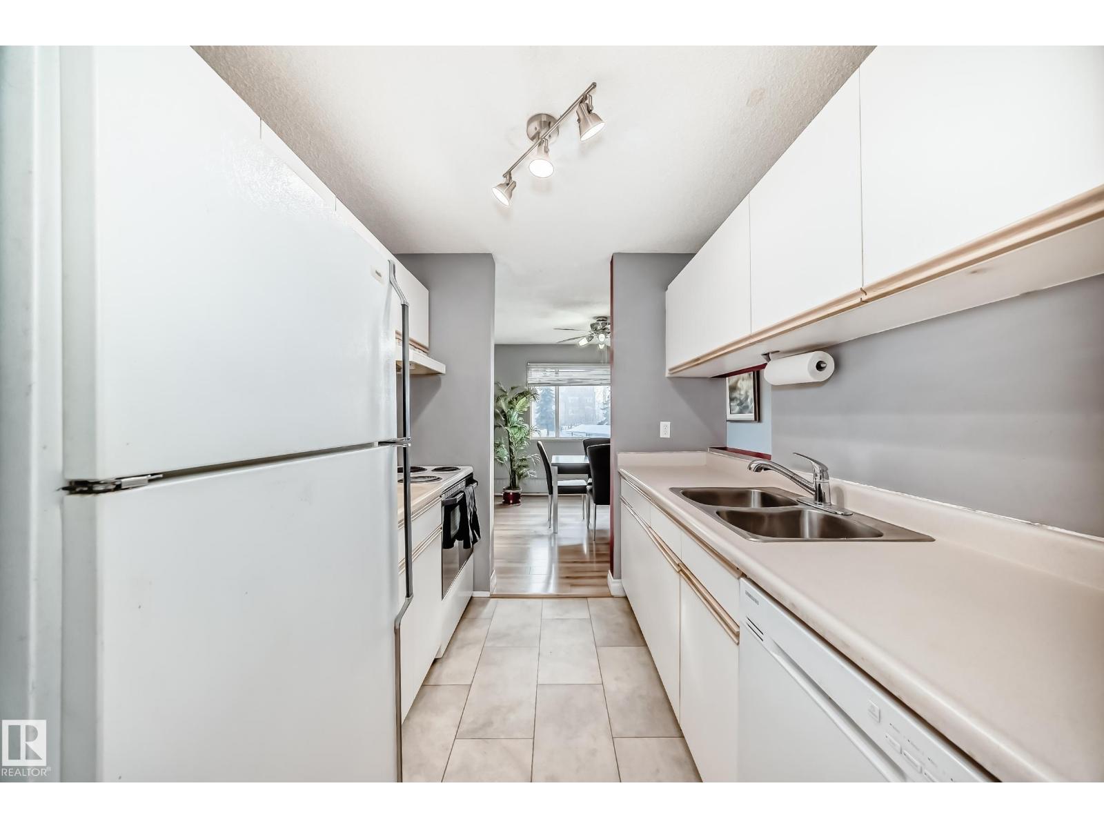 #239 10636 120 ST NW