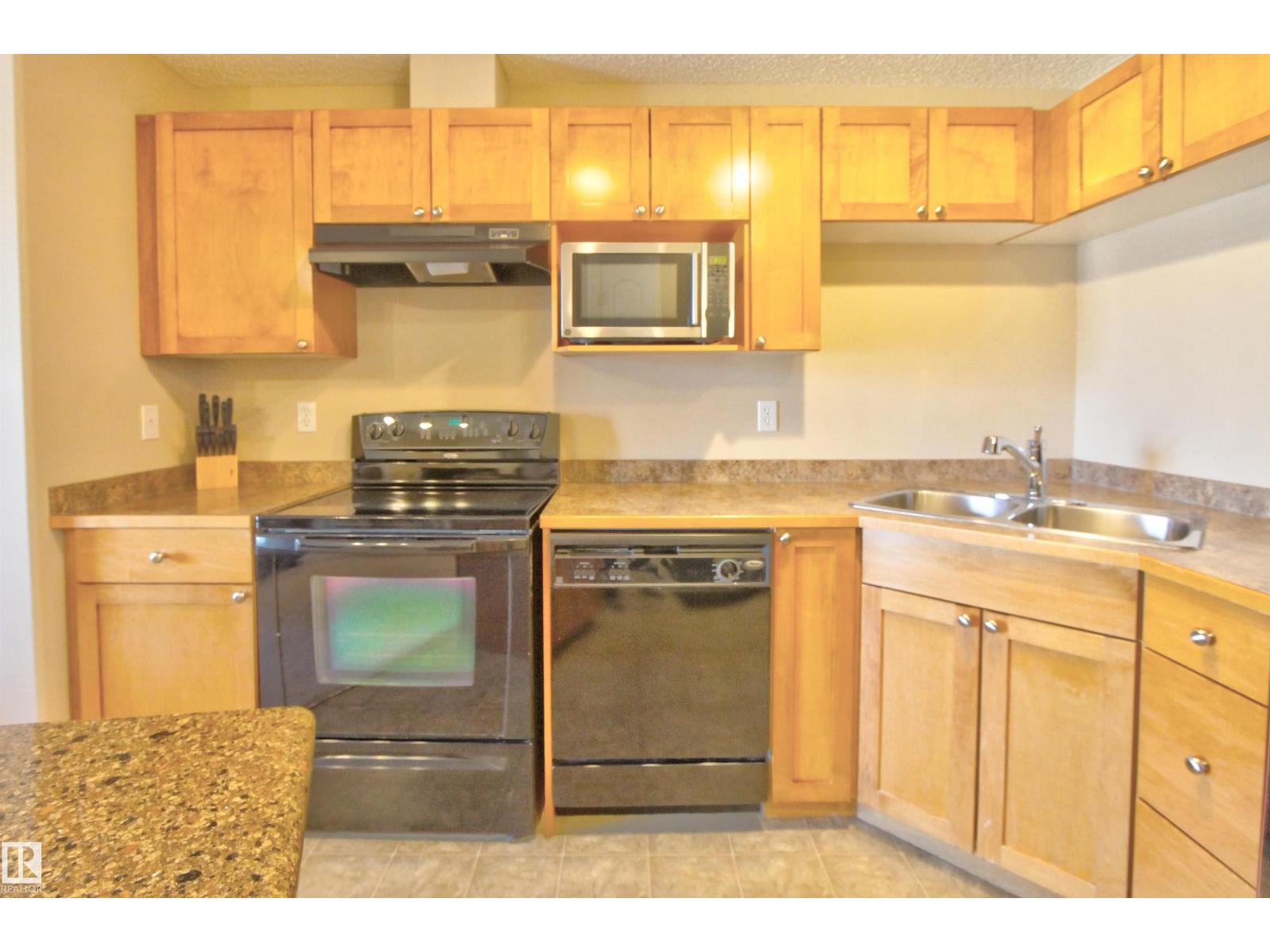#319 155 EDWARDS DR SW