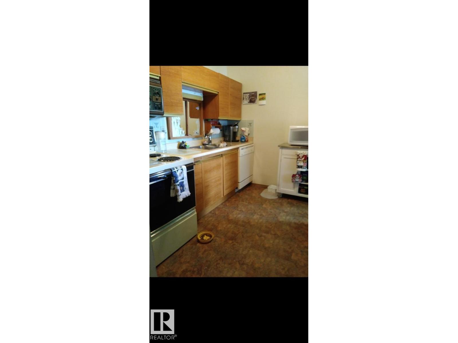 #401 10743 107 ST NW NW