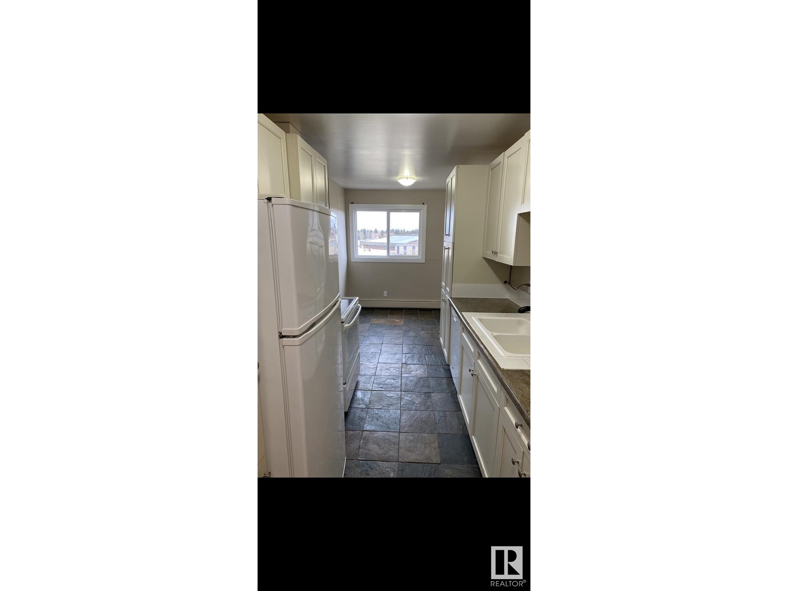 #61 11255 31 AV NW