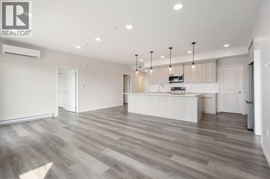 306, 360 Harvest Hills Way NE