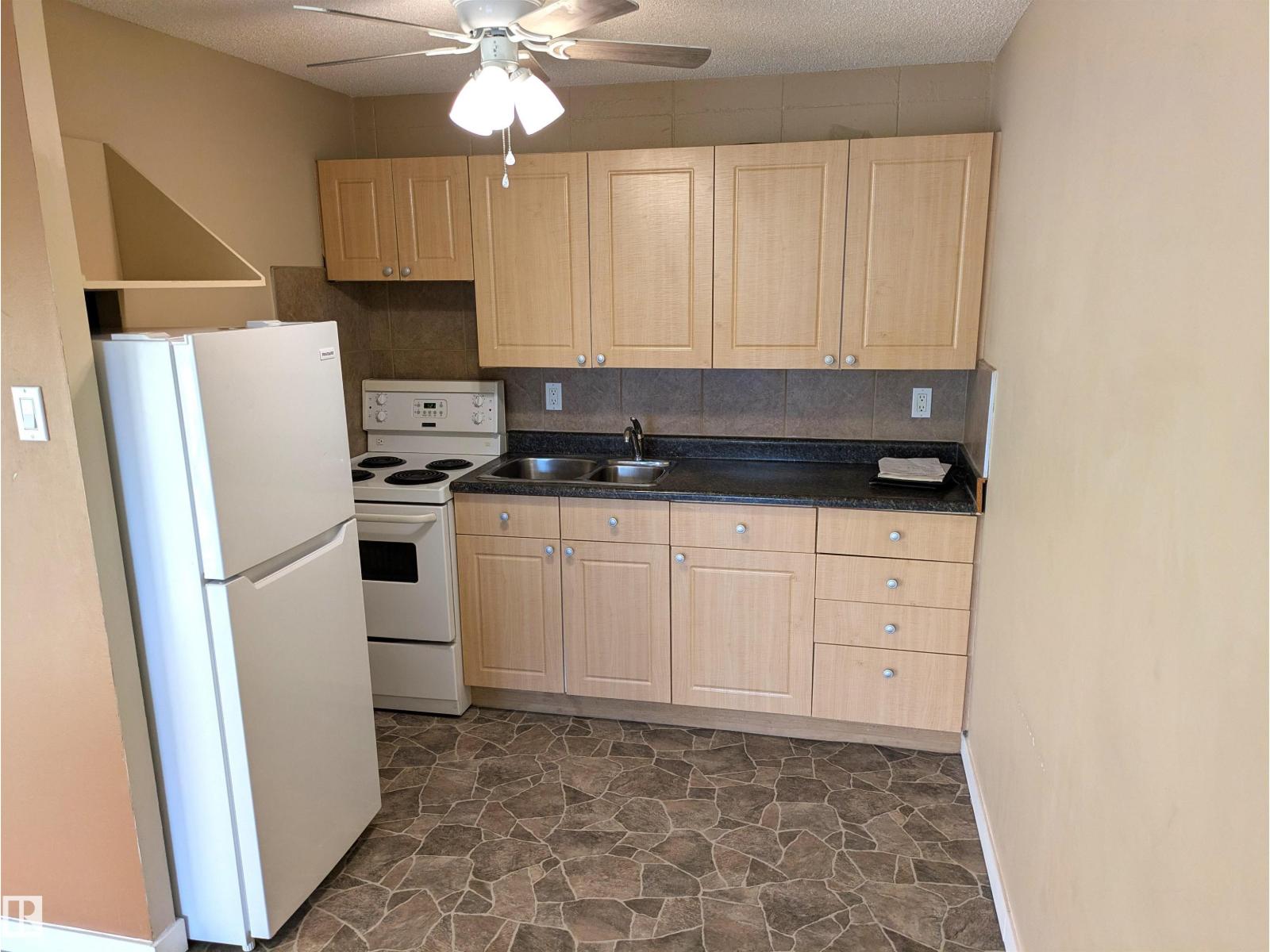 #115 10616 156 ST NW