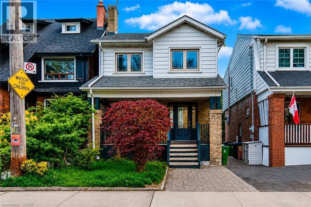 Photo 1 of 32 — 108 RUNNYMEDE Road, Toronto, ON M6S2Y3