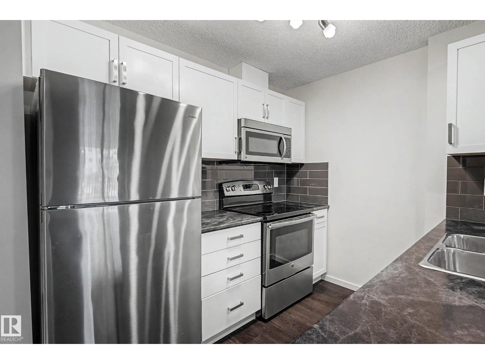 #327 5515 7 AV SW