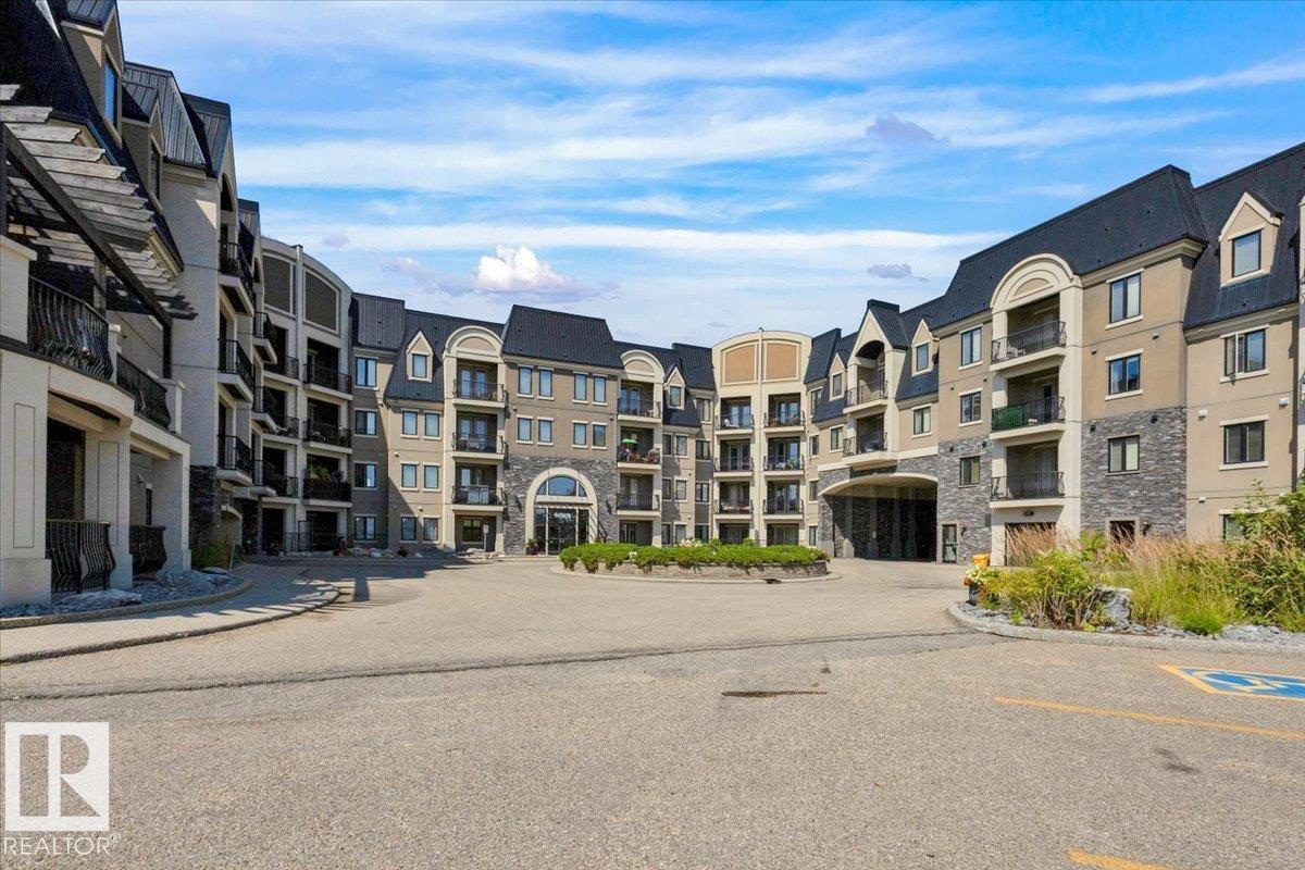 #418 6083 MAYNARD WY NW