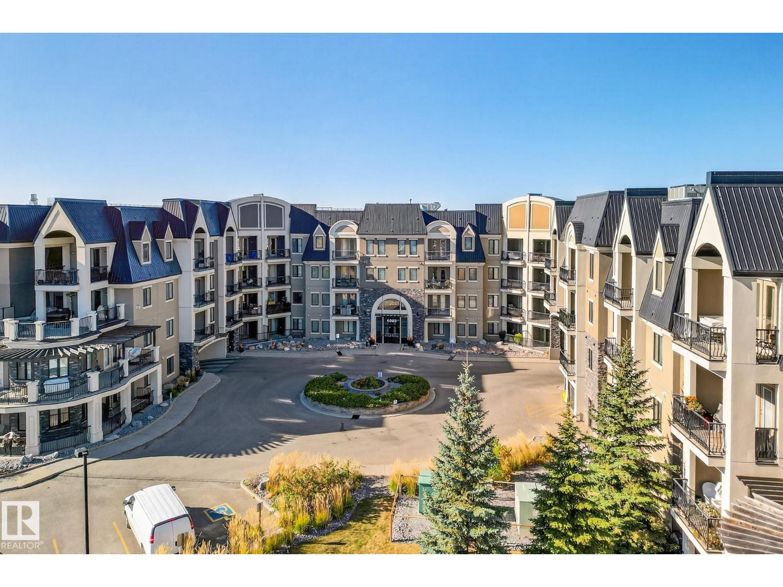 #418 6083 MAYNARD WY NW