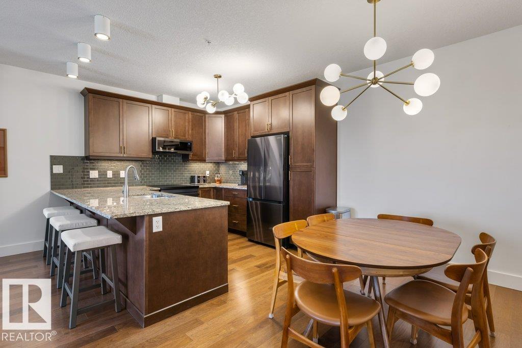 #255 6079 MAYNARD WY NW