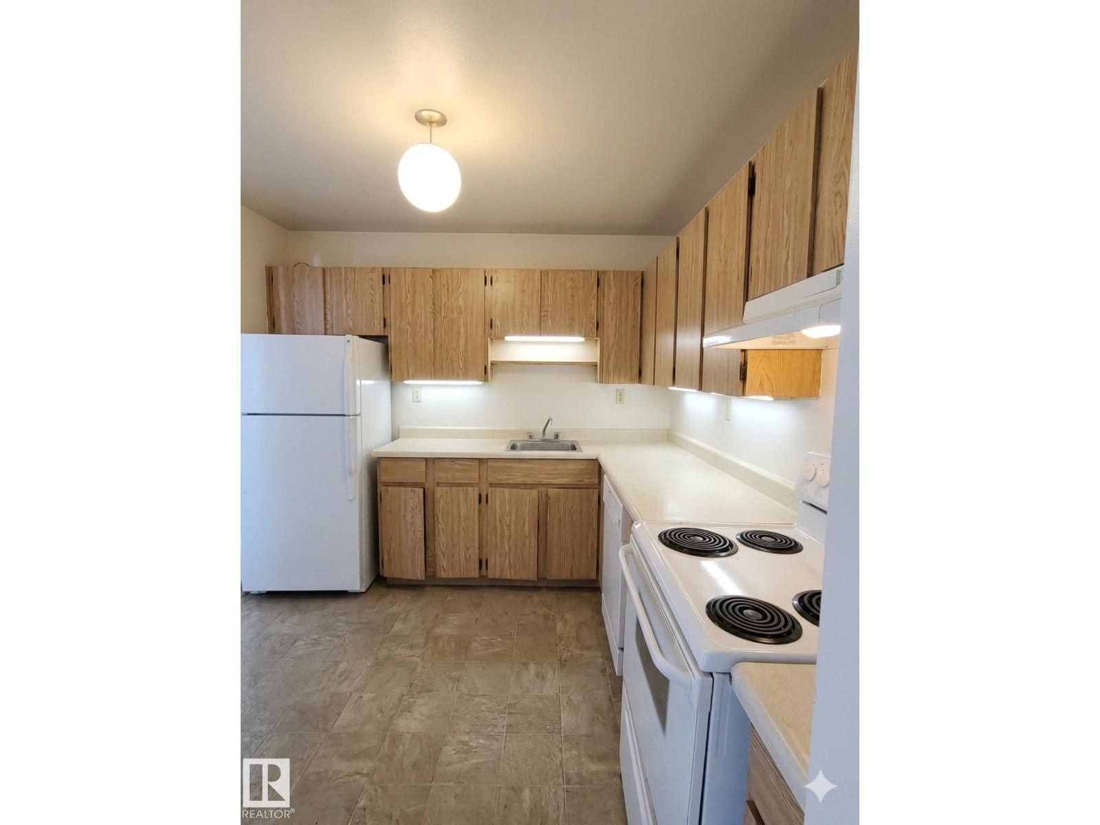 #203 1628 48 ST NW