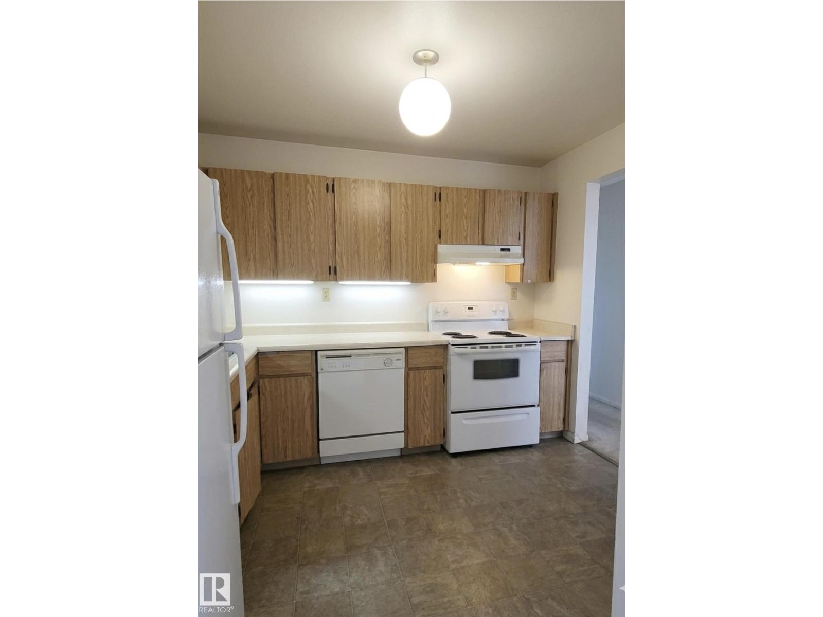 #203 1628 48 ST NW