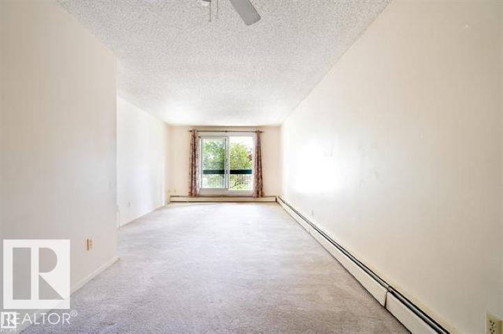 #203 1628 48 ST NW