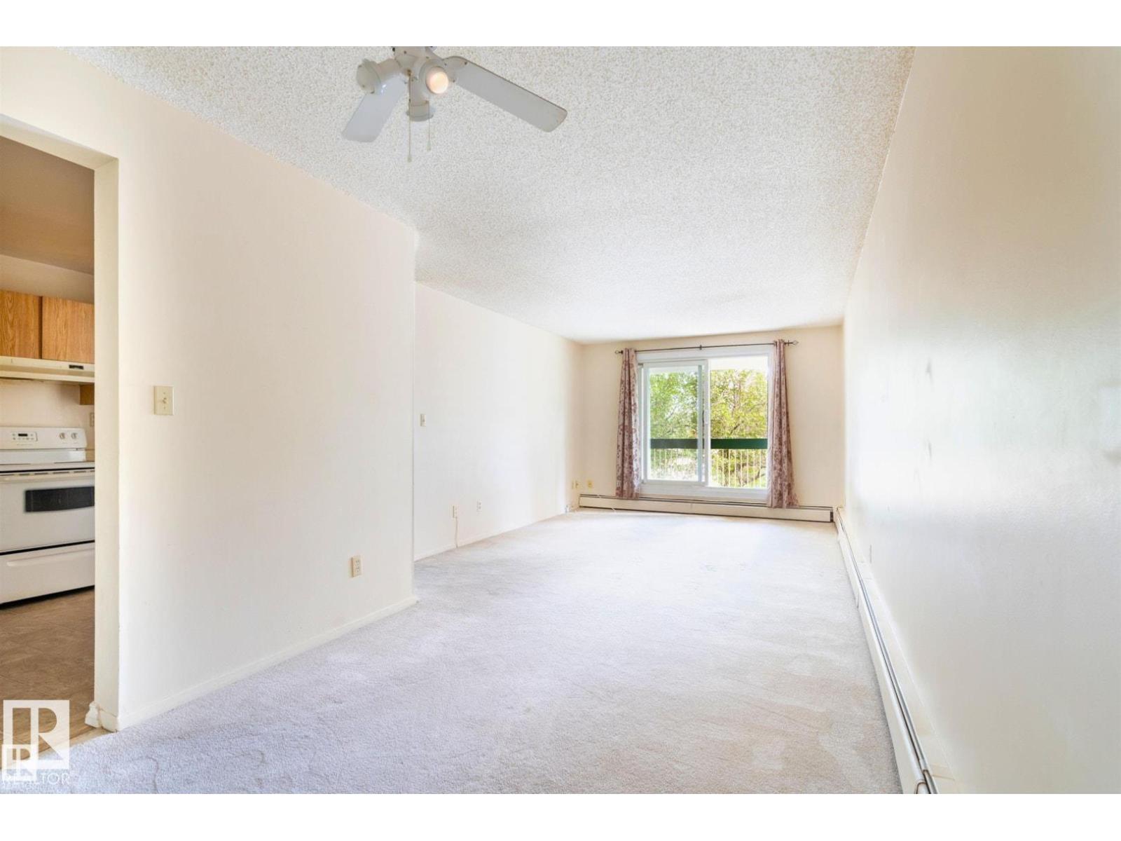 #203 1628 48 ST NW
