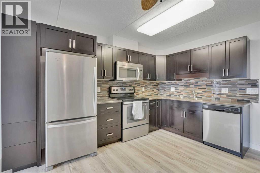 202, 408 1 Avenue SE