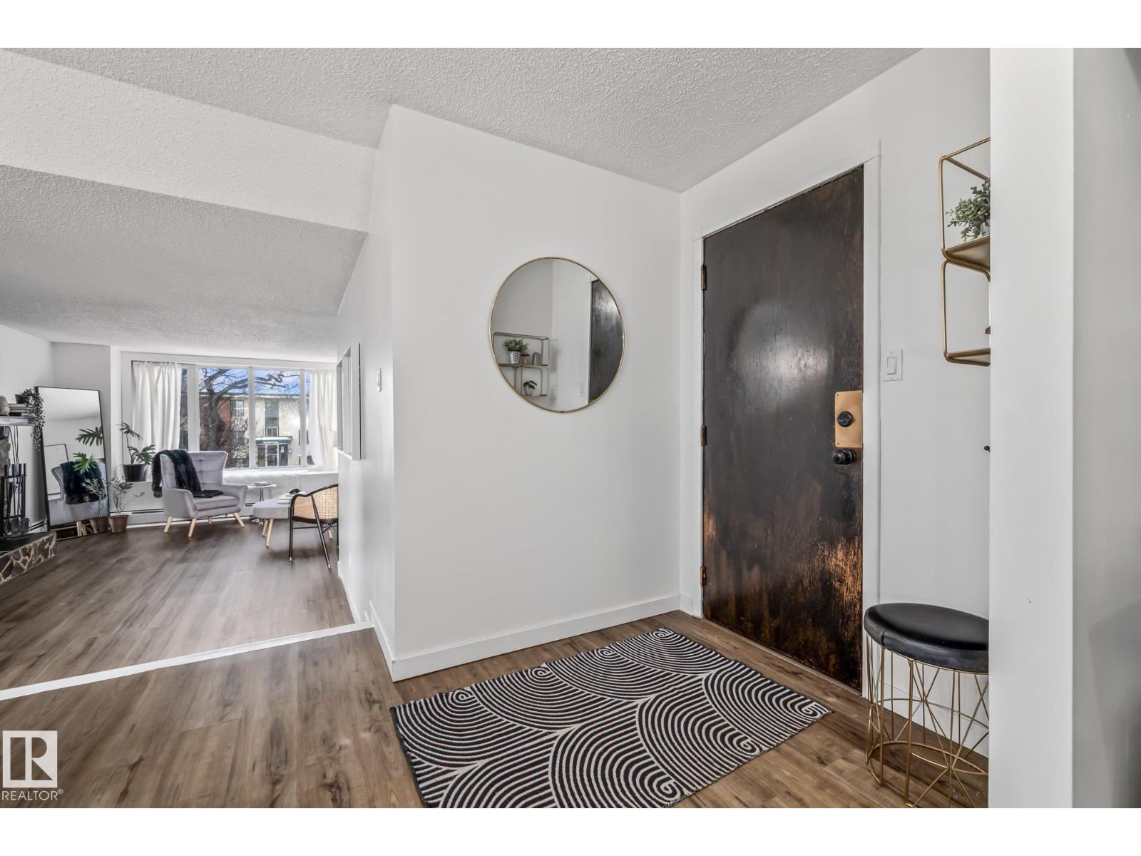 #201 10743 107 ST NW