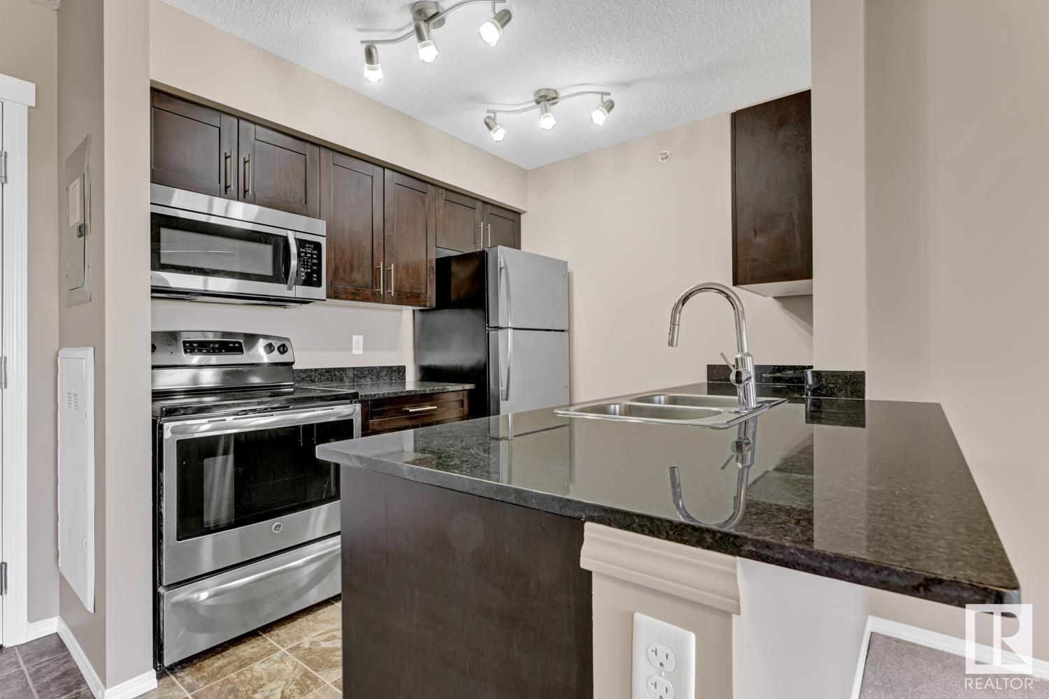 #406 12025 22 AV SW
