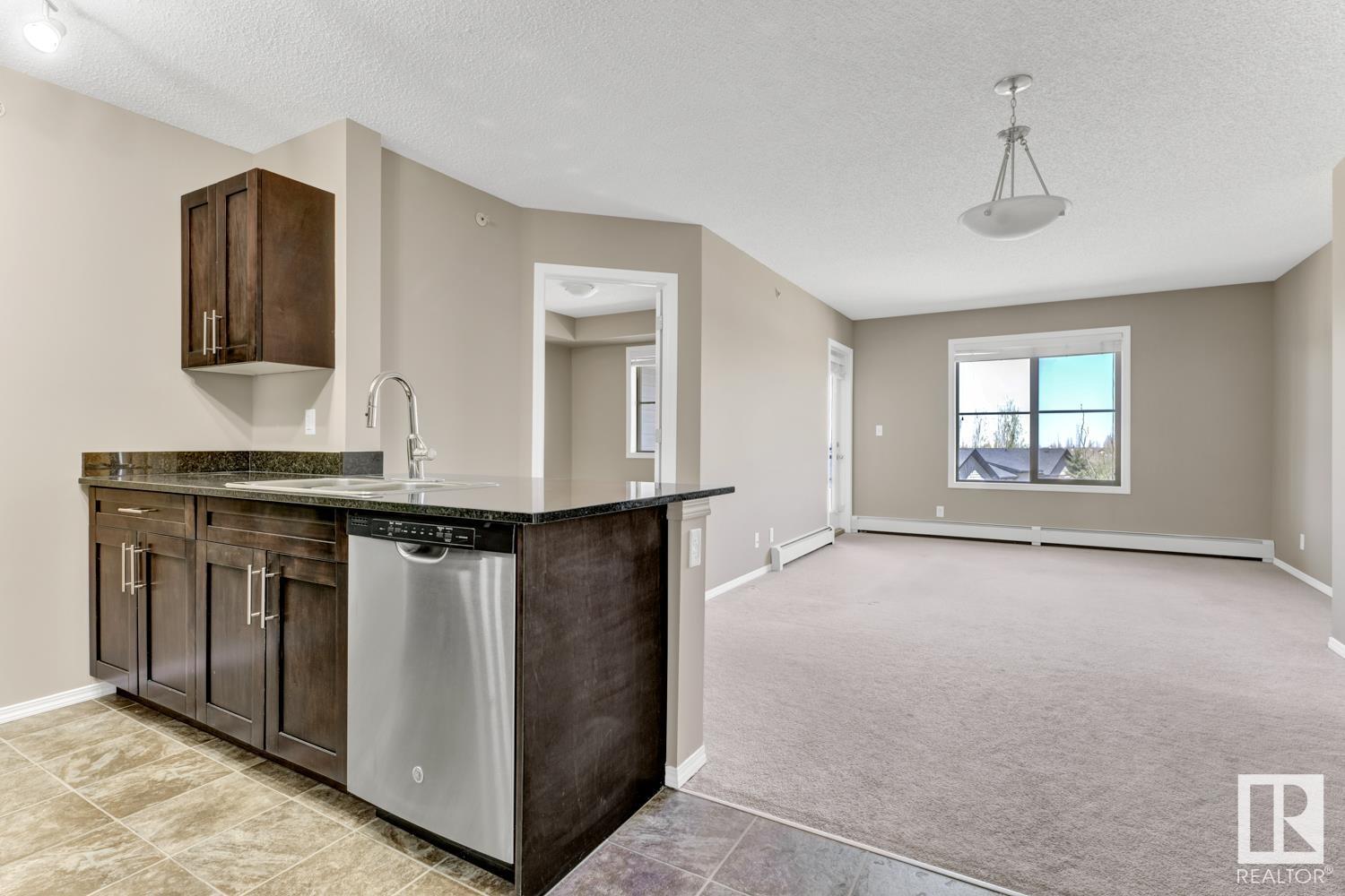 #406 12025 22 AV SW
