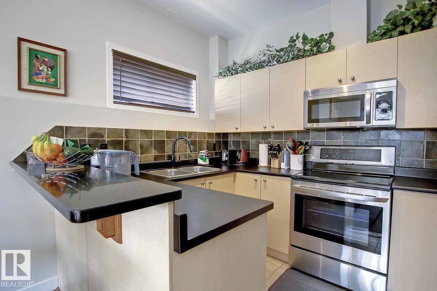 #102 10905 109 ST NW