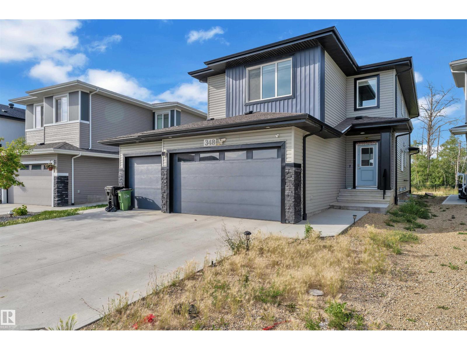348 33 AV NW