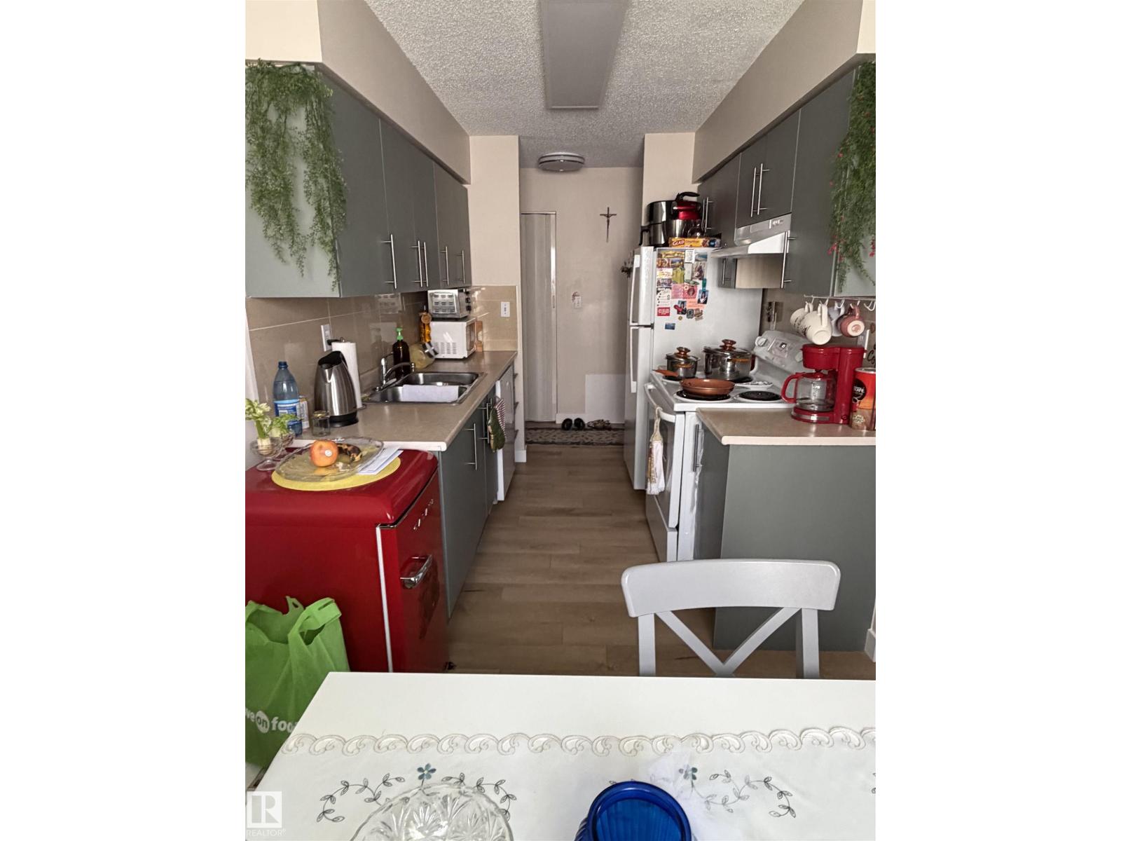#205 10604 110 AV NW NW
