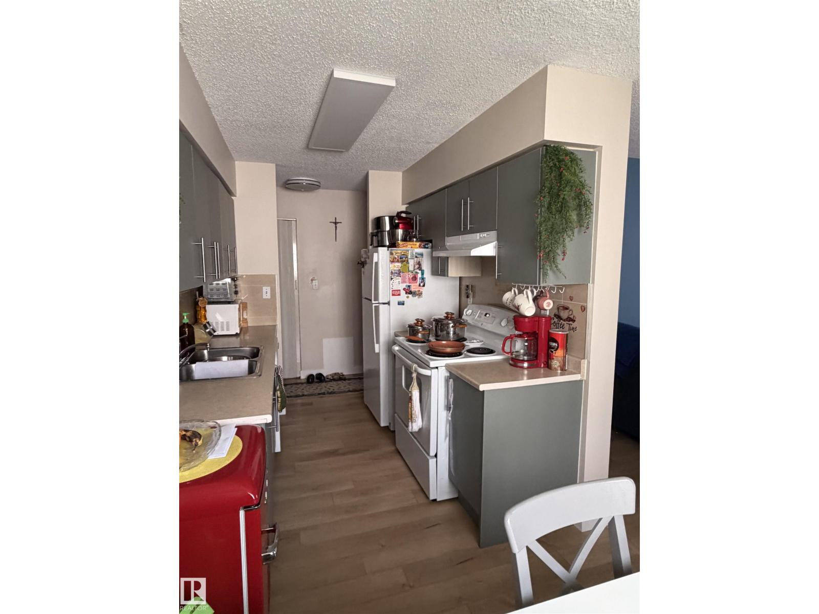 #205 10604 110 AV NW NW