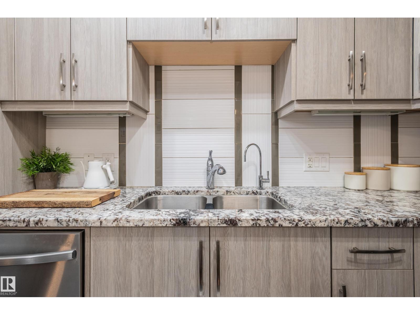 #305 10523 123 ST NW