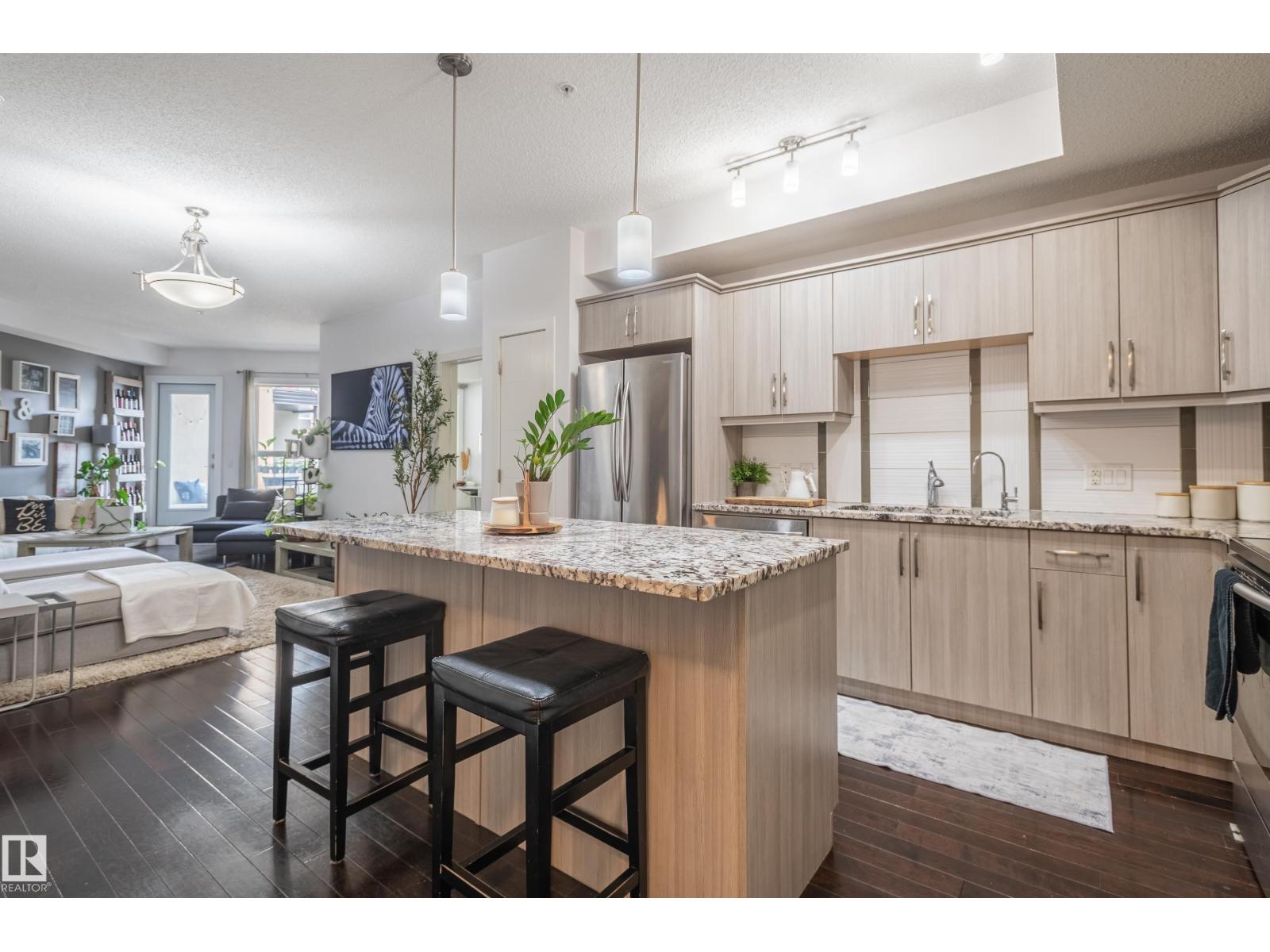 #305 10523 123 ST NW