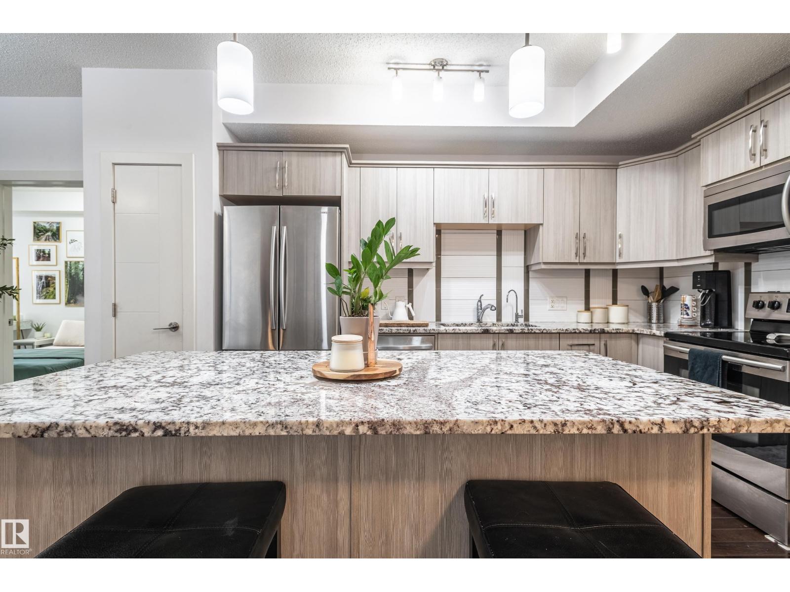 #305 10523 123 ST NW