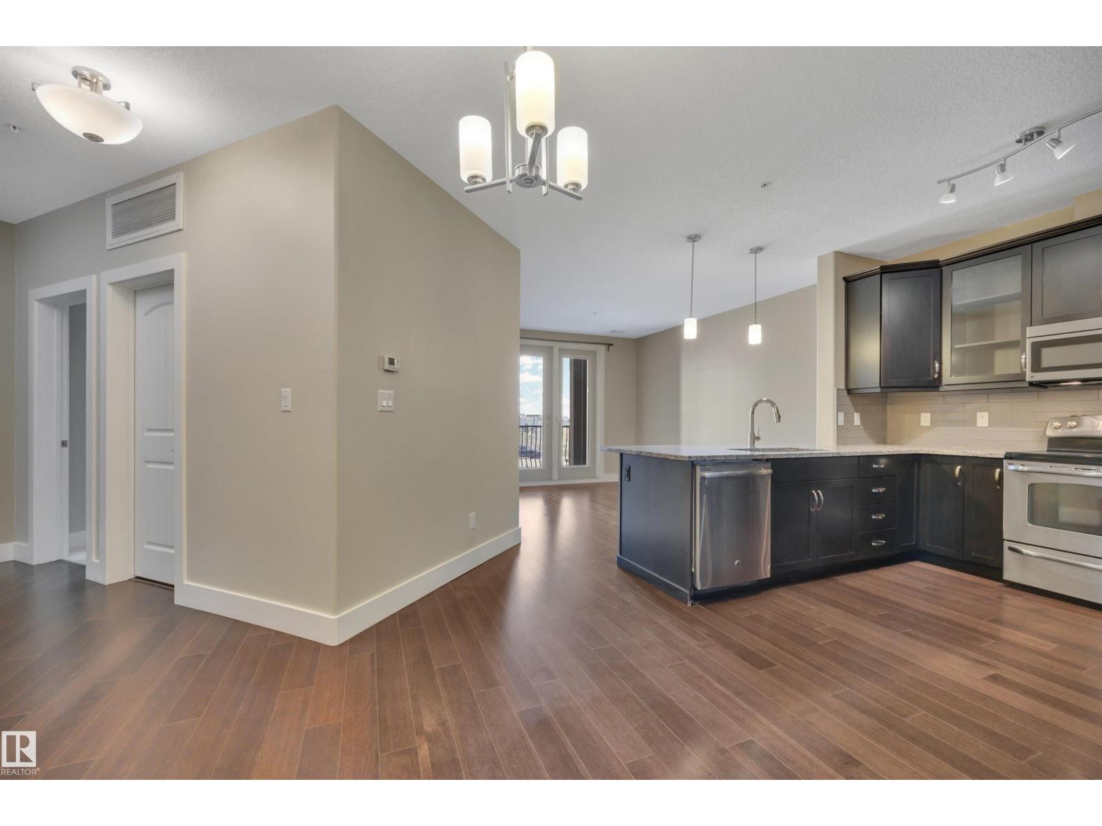 #243 6079 MAYNARD WY NW