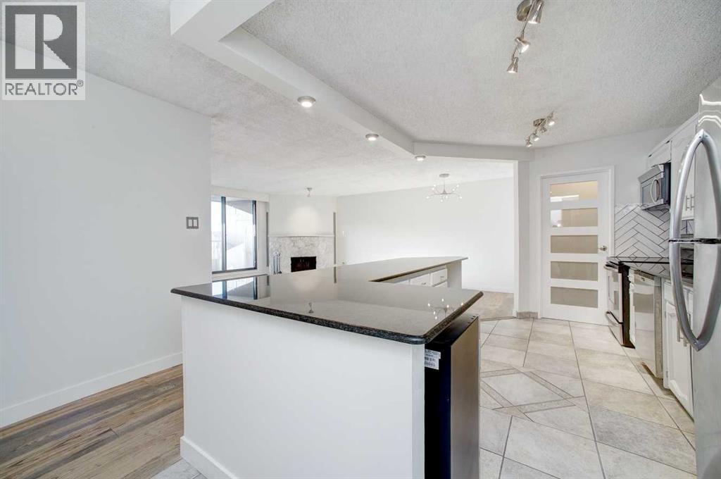 9E, 133 25 Avenue SW