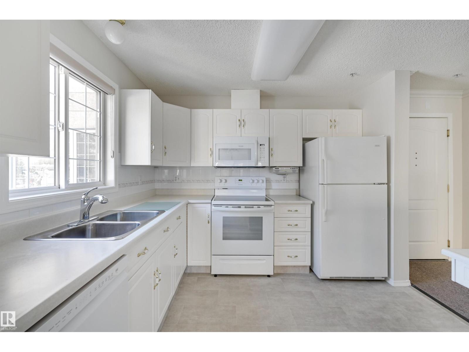 #205 13450 114 AV NW