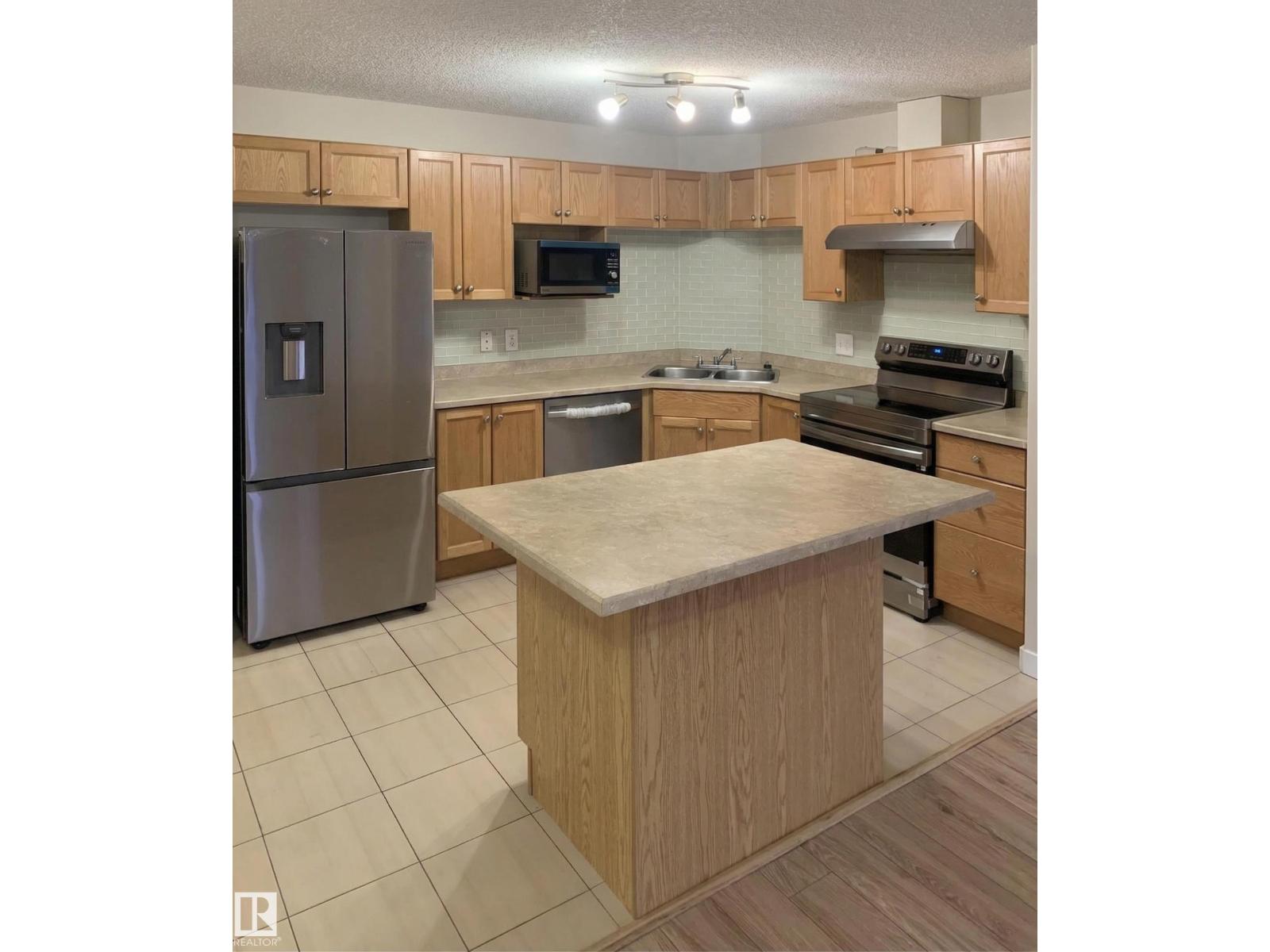 #6211 7331 SOUTH TERWILLEGAR DR NW