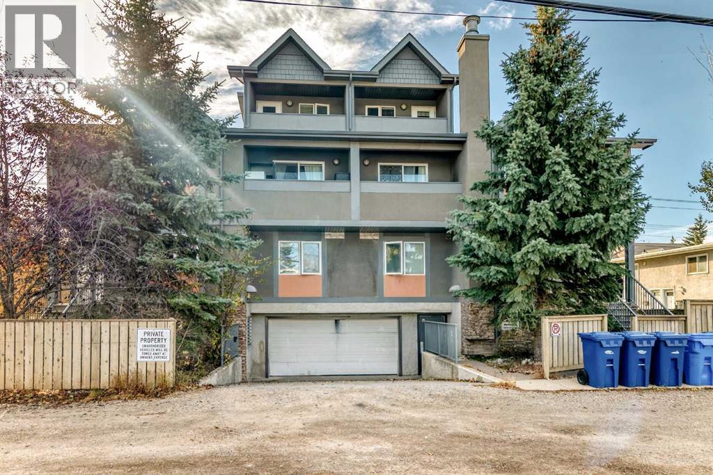 7716 bowness Road NW