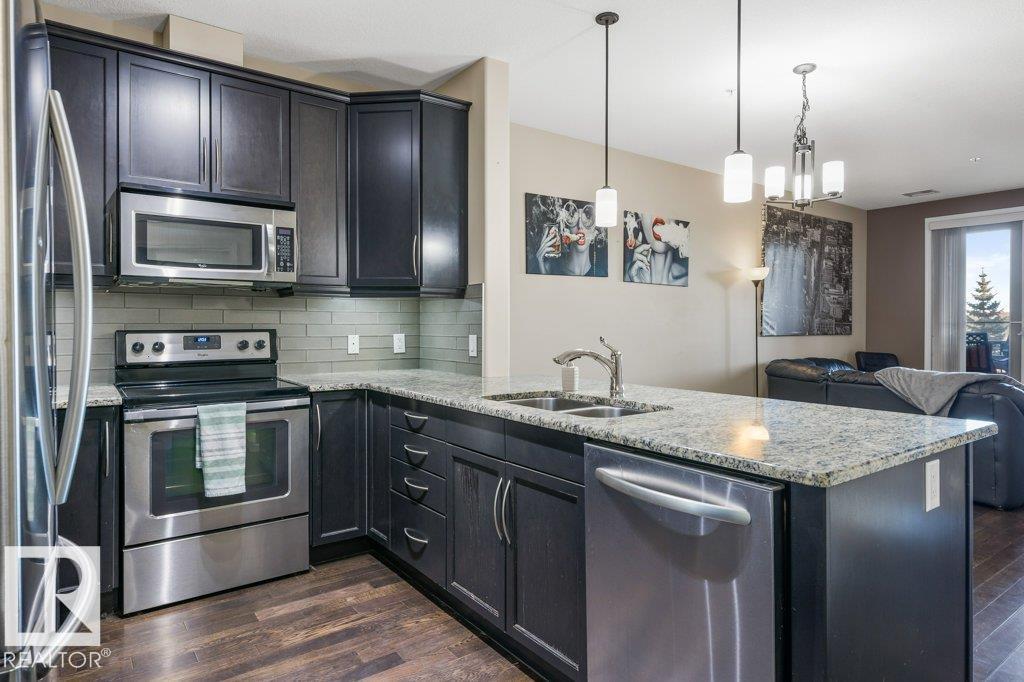 #217 6083 MAYNARD WY NW